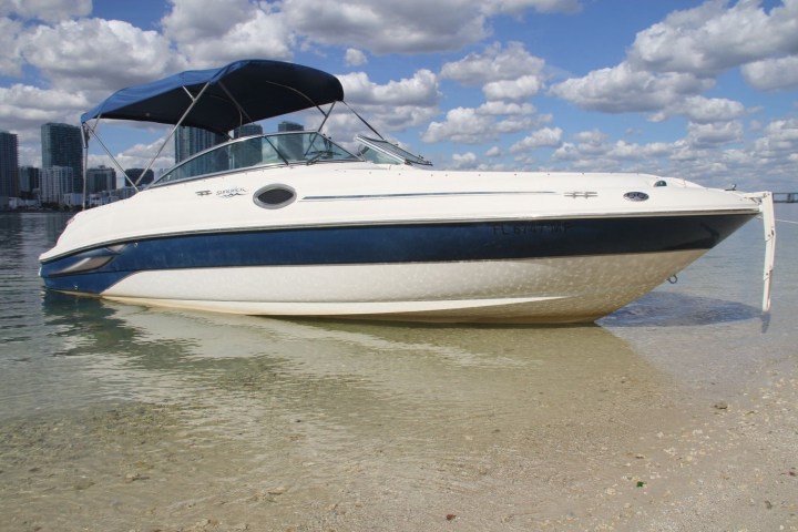 a small boat in a body of water